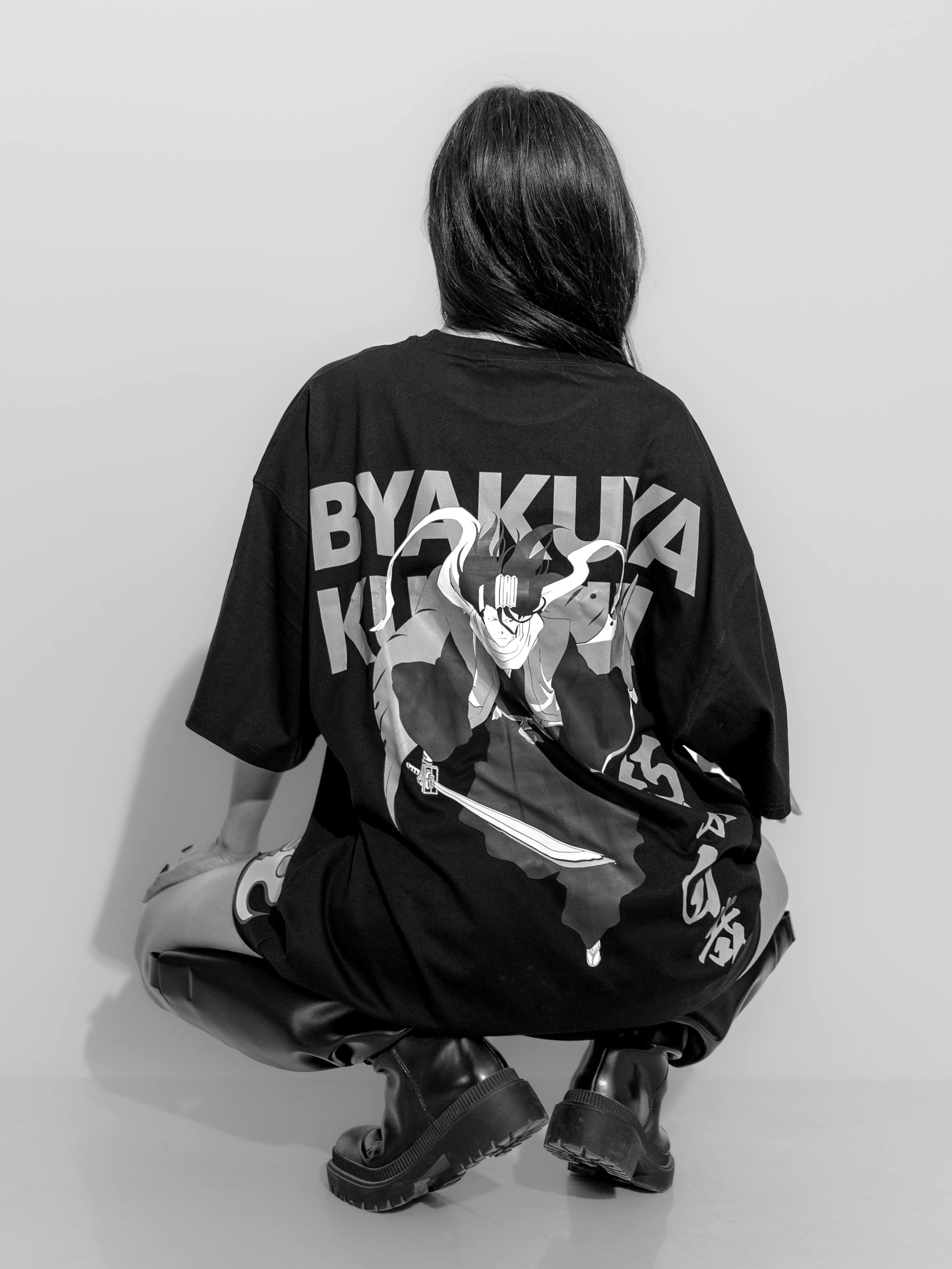 P Men’s Clothing in anime-themed streetwear, emphasizing trendy urban fashion.