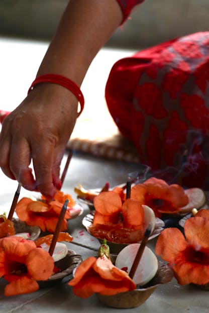 Shani Levni 
A vibrant Newari ritual with flowers and incense showcasing spiritual devotion in Nepal.