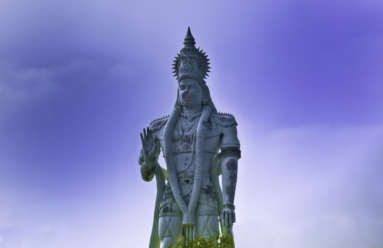 Hanuman Dham Breathtaking view of the Hanuman statue against the clear blue sky in Kanchikacherla, India.
