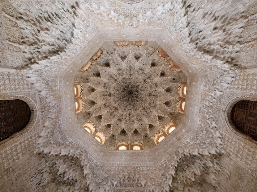 Mozarabic Hoodie Detailed view of the ornate ceiling in Alhambra Palace, showcasing Moorish architecture.
