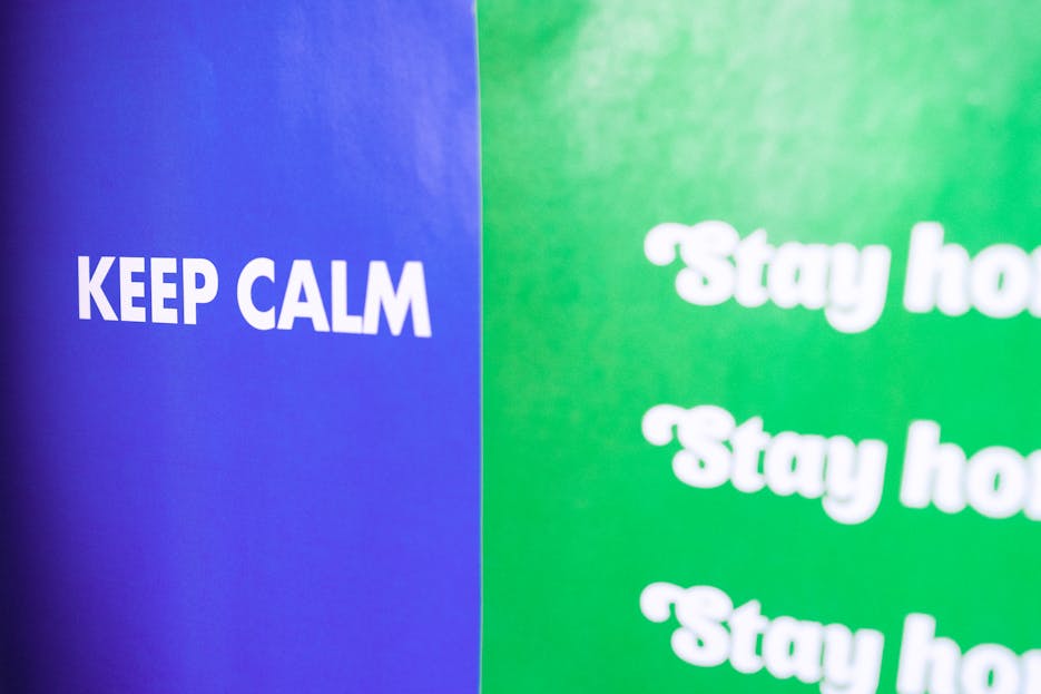 Thealite Keep Safe Inspirational poster featuring 'Keep Calm' and 'Stay Home' messages on vibrant blue and green backgrounds.