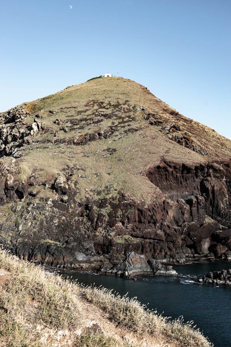 Nikane Madeira Picturesque hilltop landscape at Ponta de São Lourenço, Madeira with coastal rocks under a clear sky.
