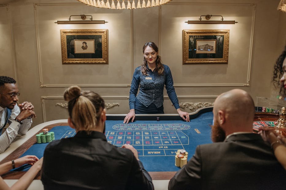 norsk casino www ribitup com Exciting casino evening with a dealer hosting a roulette game.