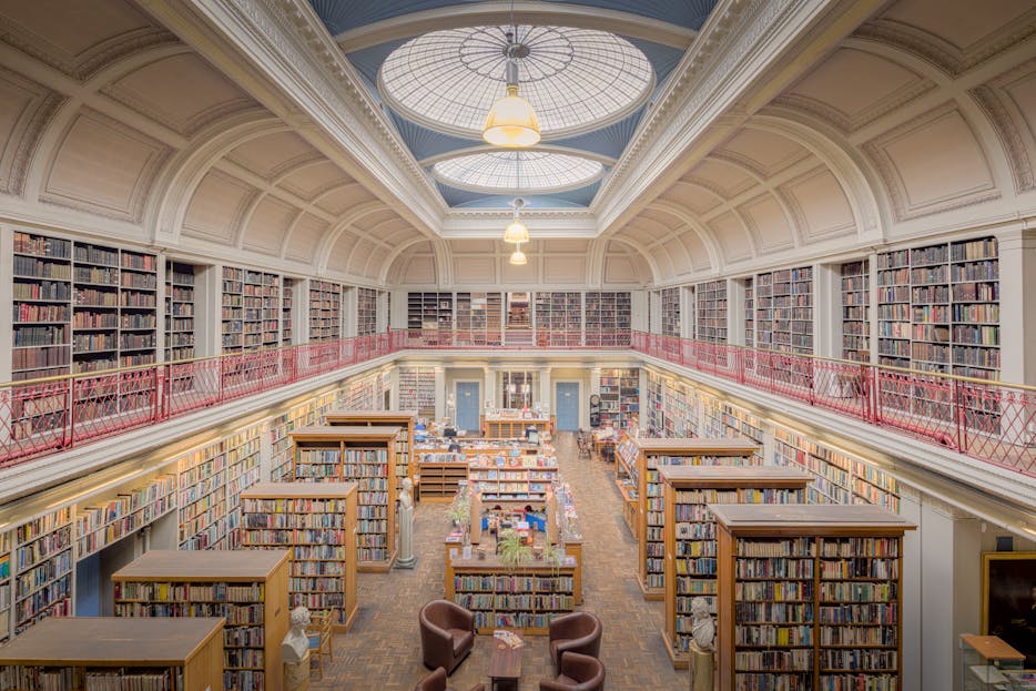 Phil or Lil of Rugrats Crossword Beautiful interior of a historic library in England with bookshelves and dome ceiling.