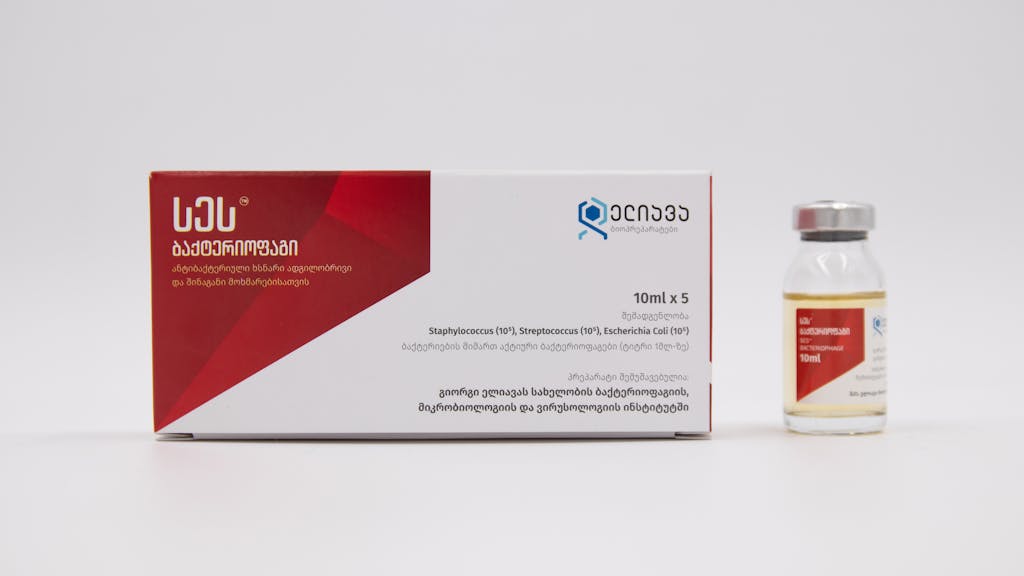 CenturyLinkOnline.com Close-up photo of antibiotic medicine packaging with vial on a white background.